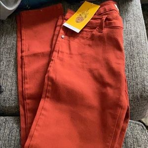 NWT rust colored skinny jeans